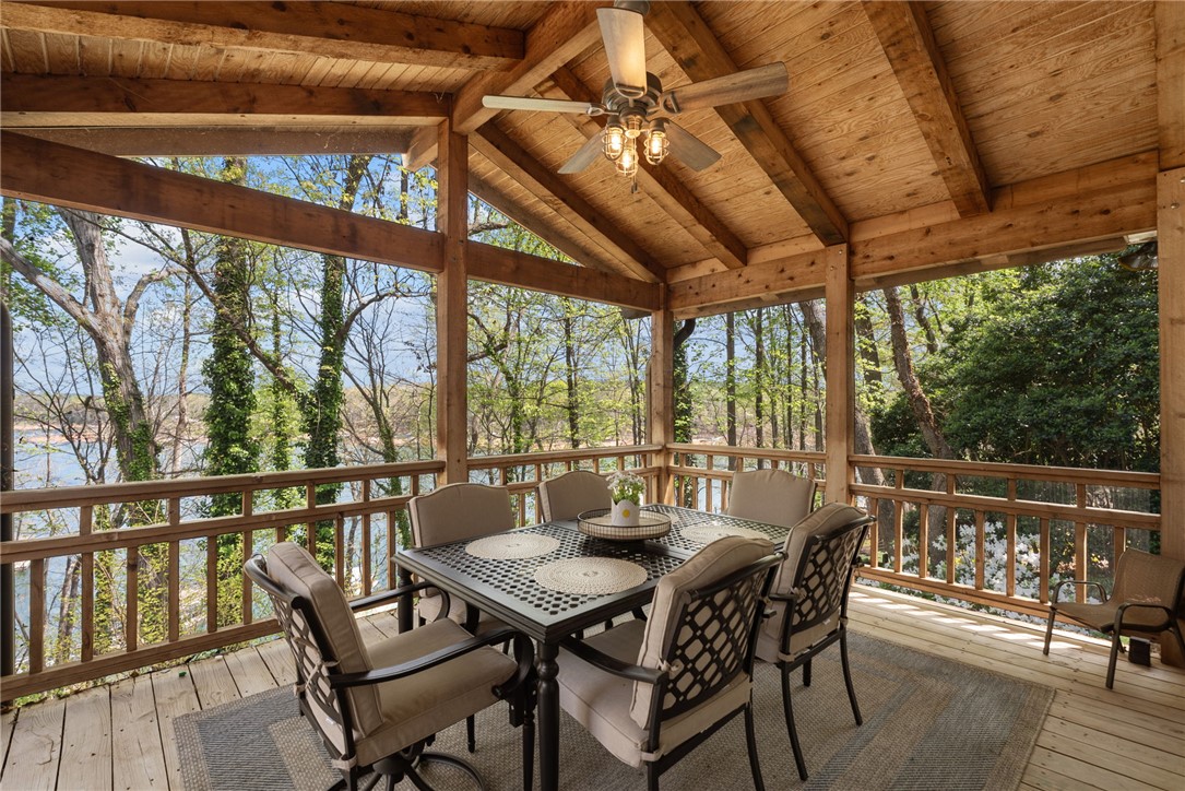 1002 Whitfield Point Road Anderson, SC 29626 - Photo 33 of 49 This inviting porch offers captivating water views, perfect for peaceful outdoor living and relaxation.