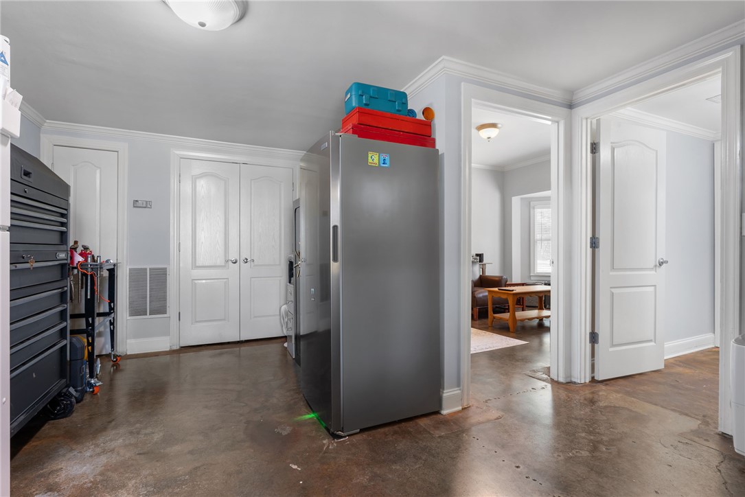 1002 Whitfield Point Road Anderson, SC 29626 - Photo 46 of 49 This versatile space offers a large refrigerator and access to additional rooms.