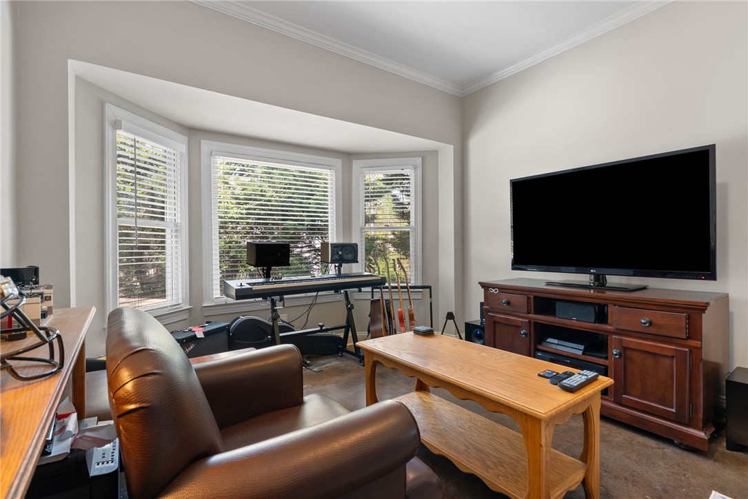 1002 Whitfield Point Road Anderson, SC 29626 - Photo 47 of 49 This bright and airy living space offers ample natural light through large bay windows.