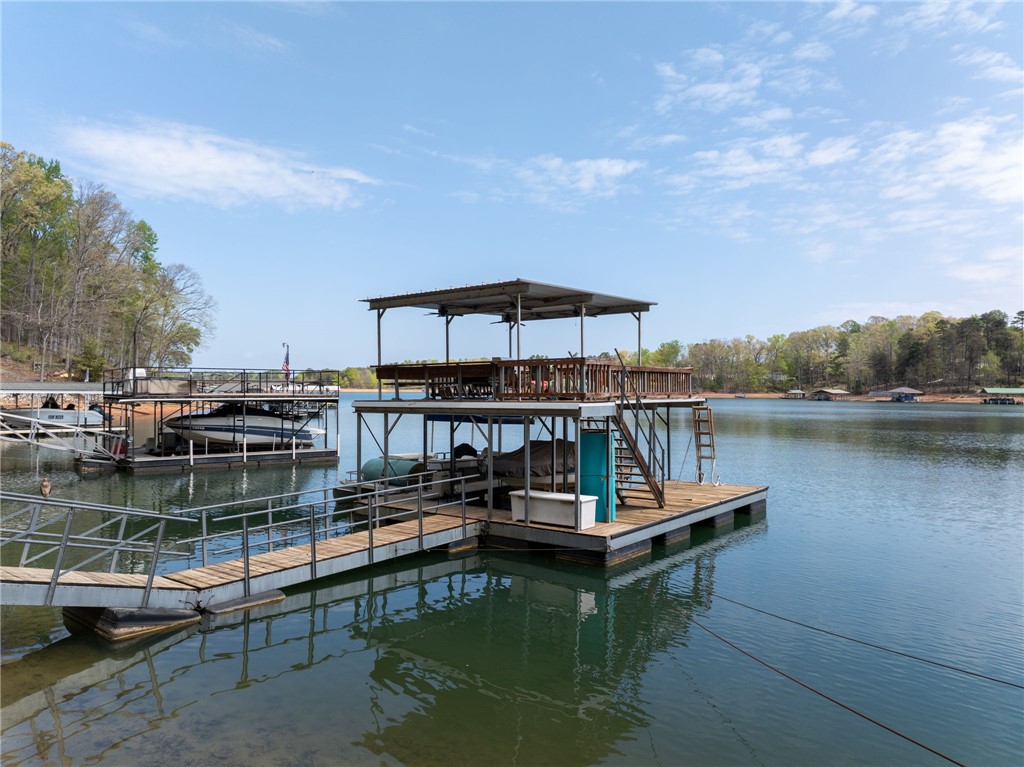 1002 Whitfield Point Road Anderson, SC 29626 - Photo 5 of 49 This serene waterfront property offers direct lake access and a private boat dock.