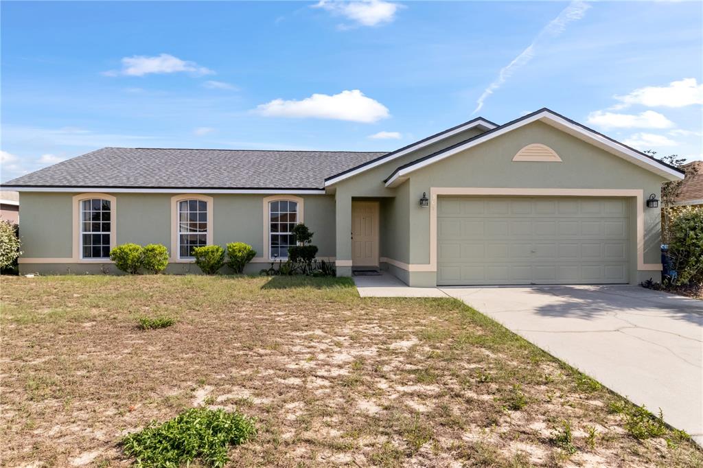 367 Cloverdale Road Winter Haven, FL 33884 - Photo 1 of 1 a view of backyard of the house