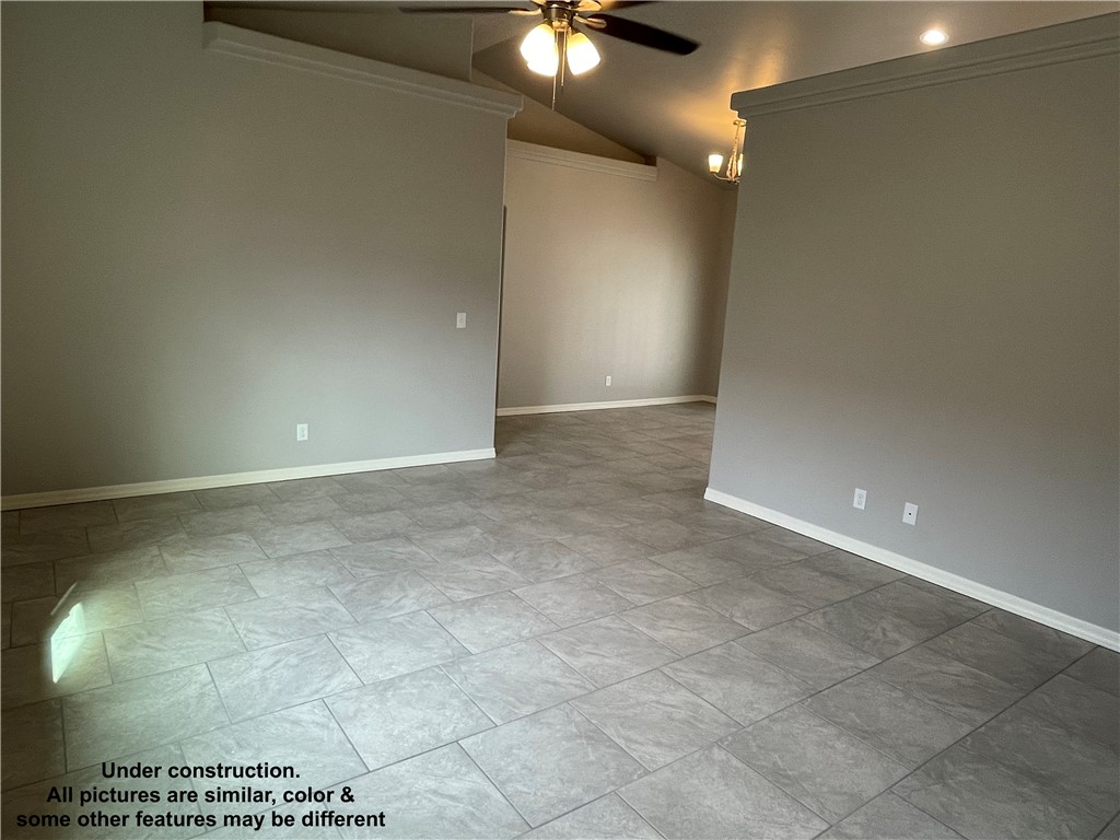3591 North Verdugo Road Kingman, AZ 86409 - Photo 5 of 19 The interior features vaulted ceilings, tile flooring, and light gray painted walls