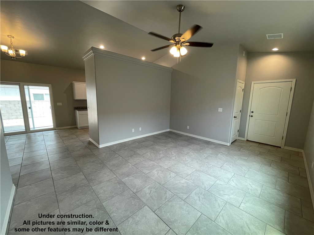3591 North Verdugo Road Kingman, AZ 86409 - Photo 6 of 19 Spacious interior featuring a neutral color palette, ceiling fan, recessed lighting, and tile flooring