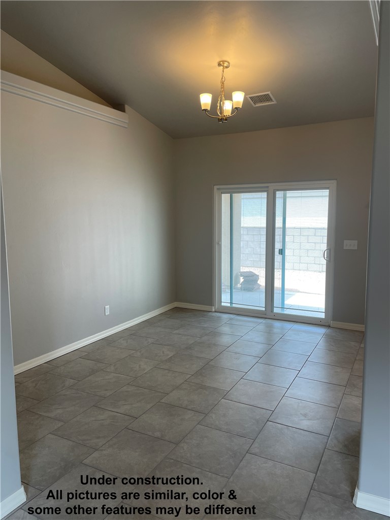 3591 North Verdugo Road Kingman, AZ 86409 - Photo 7 of 19 This space features tiled flooring and a chandelier lighting fixture