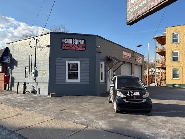 a car parked in front of a building