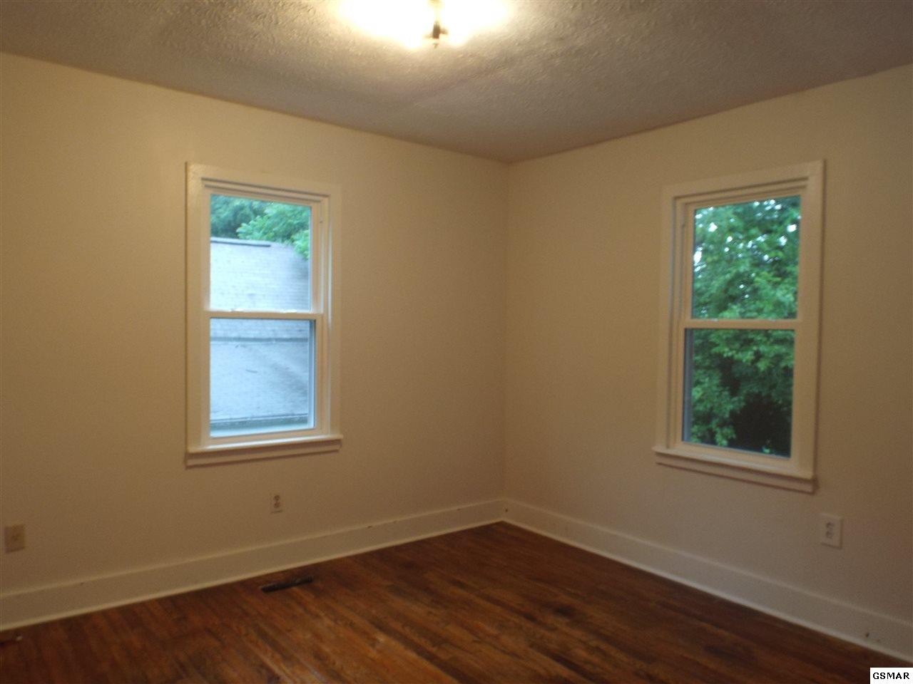 632 Park Road Sevierville, TN 37862 - Photo 3 of 13 an empty room with a window