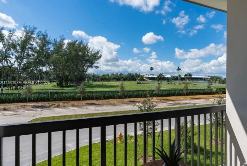 2320 East 4th Avenue, Unit 102 Hialeah, FL 33013 - Photo 5 of 9 a view of a balcony with an outdoor space