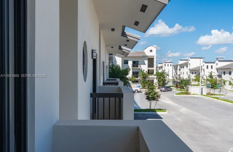 2320 East 4th Avenue, Unit 102 Hialeah, FL 33013 - Photo 7 of 9 a view of a balcony