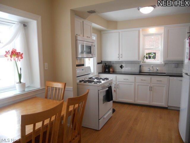 2441 Channing Road Cleveland, OH 44118 - Photo 4 of 16 Spacious Eat-in Kitchen, Updated in 2013 with Granite Counters, Hardwood Floors, Pantry and All New Appliances