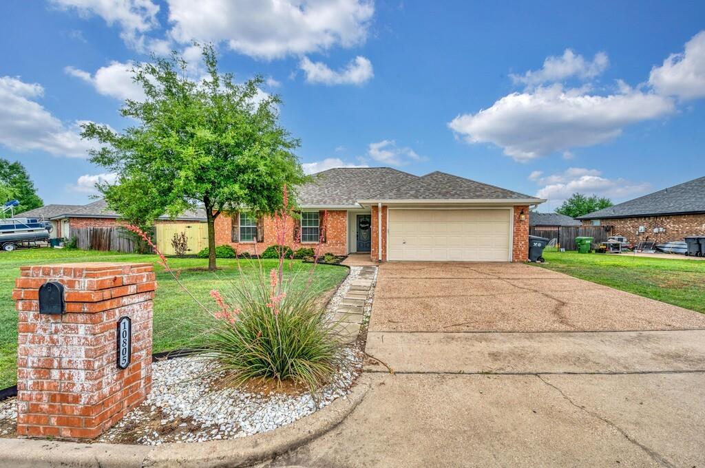 10805 Lilry Road Waco, TX 76708 - Photo 1 of 1 a front view of a house with a garden