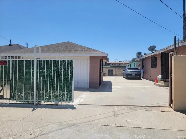 a house view with a garden space