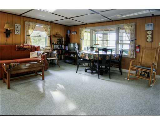 53 Dam Site Road Sebago, ME 04029 - Photo 9 of 11 Living Room.