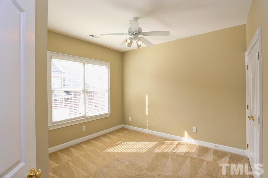 3109 Bentley Hill Road Raleigh, NC 27612 - Photo 18 of 25 a view of an empty room with a window
