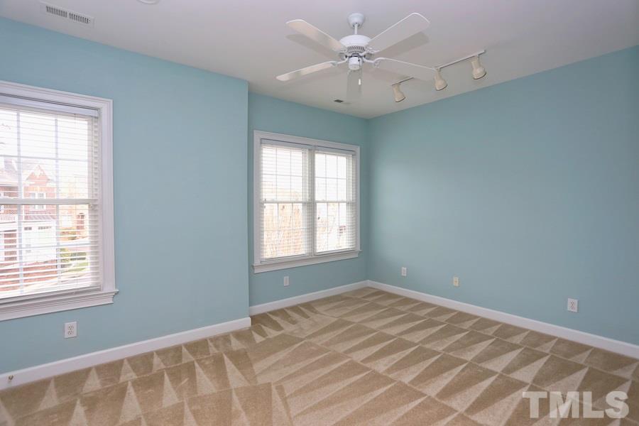 3109 Bentley Hill Road Raleigh, NC 27612 - Photo 19 of 25 a view of an empty room with a window