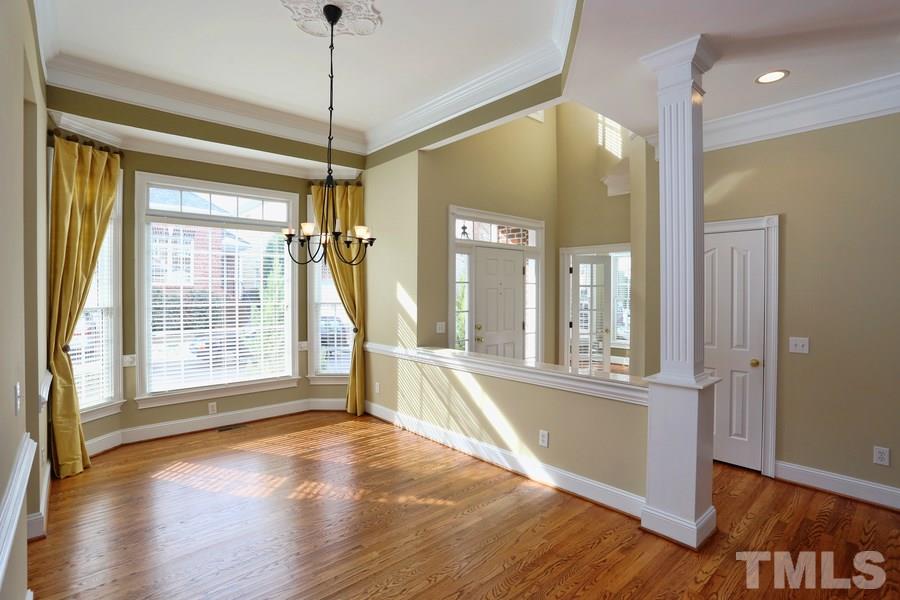 3109 Bentley Hill Road Raleigh, NC 27612 - Photo 4 of 25 a view of a room with window and hardwood floor