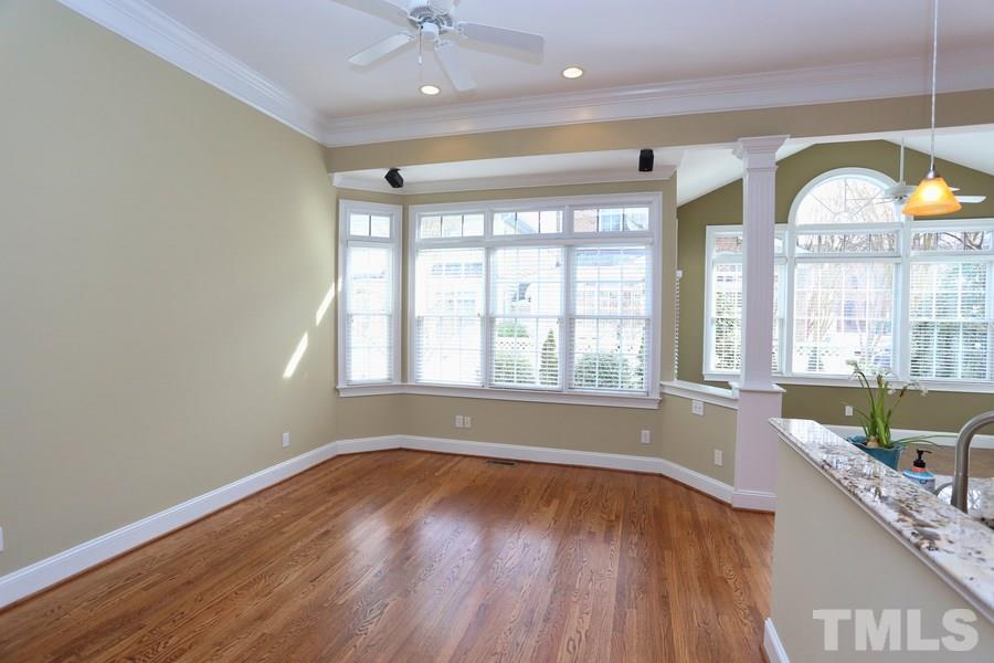 3109 Bentley Hill Road Raleigh, NC 27612 - Photo 7 of 25 a view of room with window and wooden floor