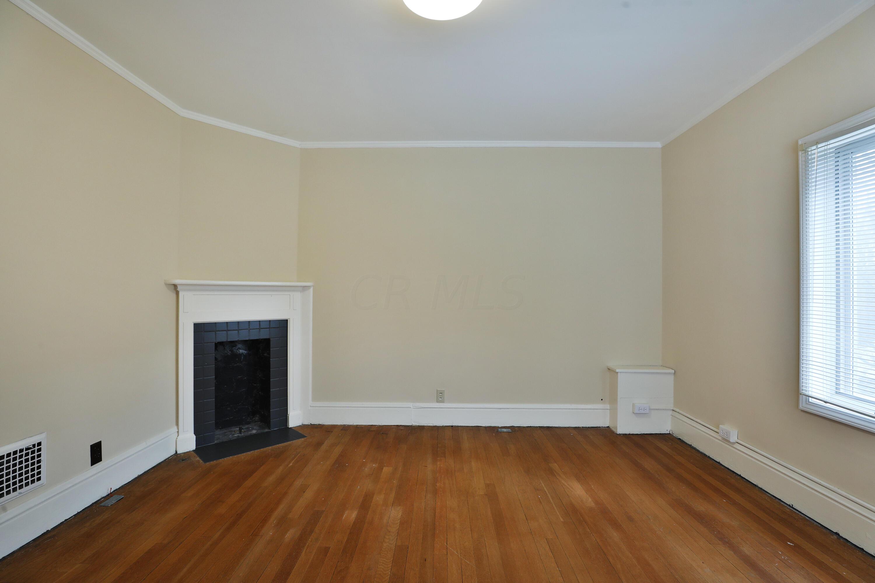 2180 Bryden Road Columbus, OH 43209 - Photo 35 of 56 New overhead light, Original hardwood doors.