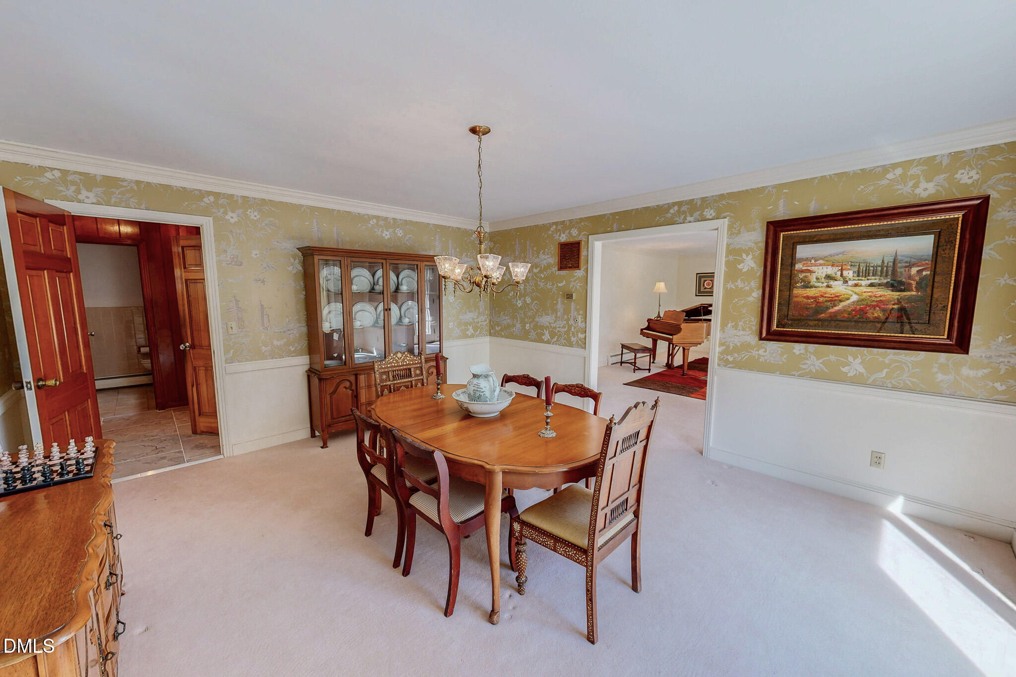 382 Wimbledon Drive Roxboro, NC 27573 - Photo 16 of 66 a view of a dining room with furniture and window