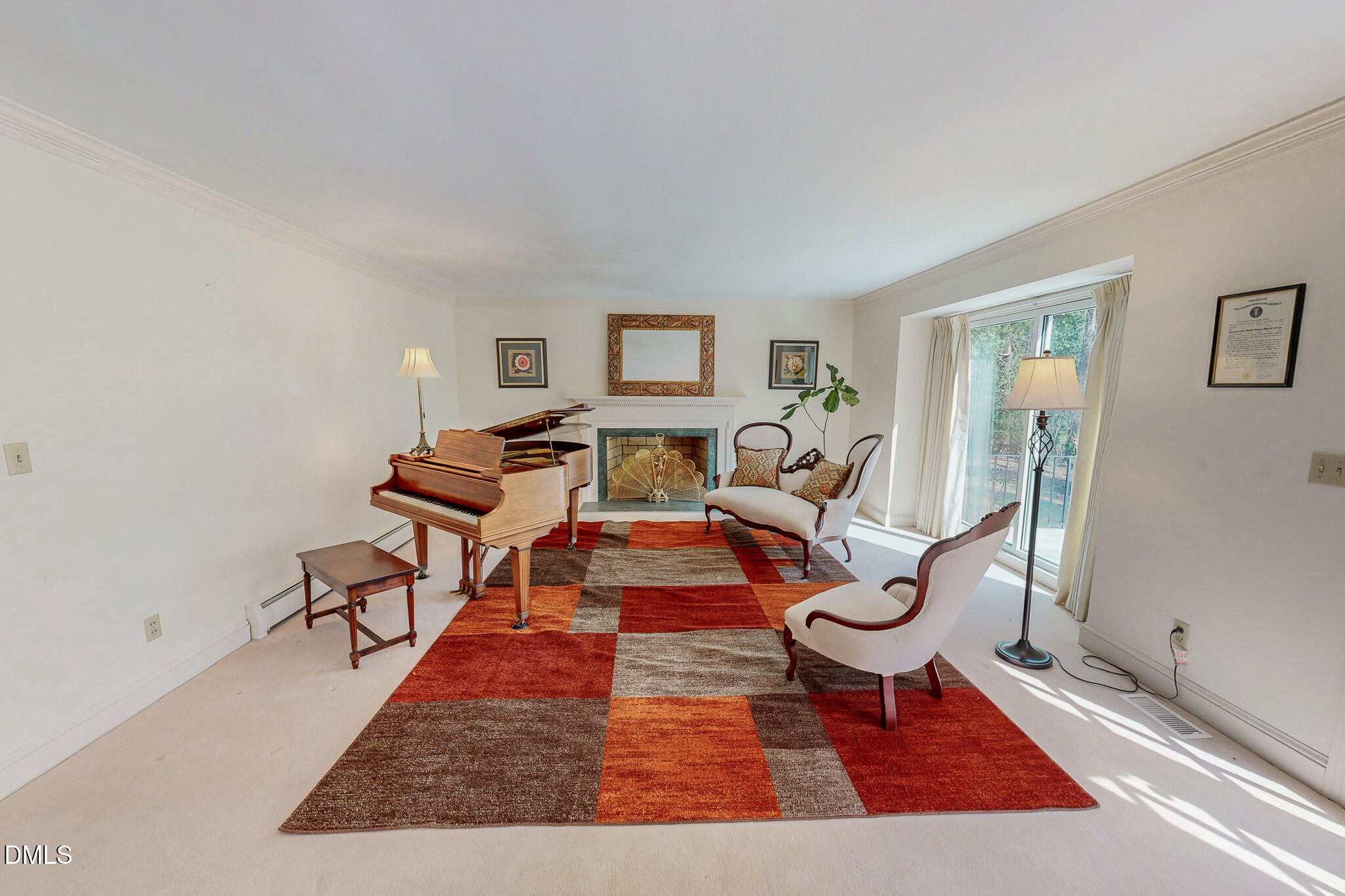 382 Wimbledon Drive Roxboro, NC 27573 - Photo 17 of 66 a living room with lots of furniture and a rug