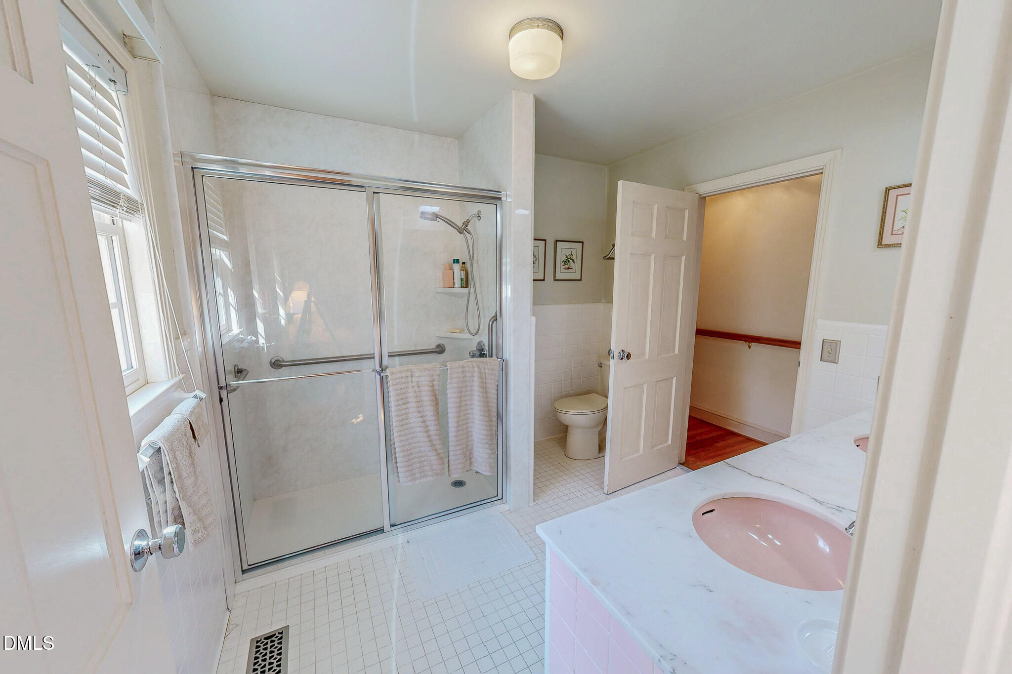 382 Wimbledon Drive Roxboro, NC 27573 - Photo 46 of 66 a bathroom with a tub and a sink