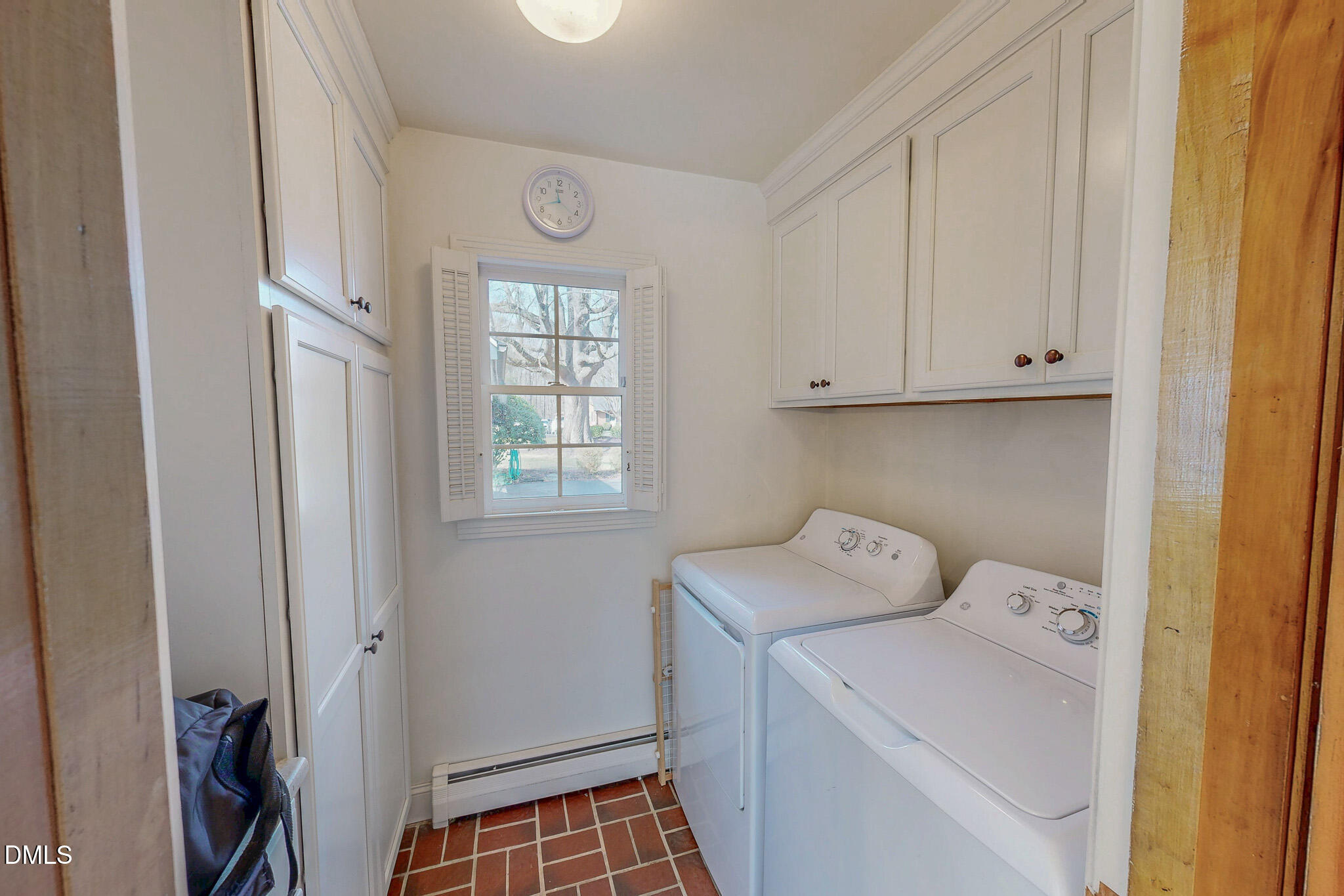 382 Wimbledon Drive Roxboro, NC 27573 - Photo 49 of 66 a view of utility room with washer and dryer