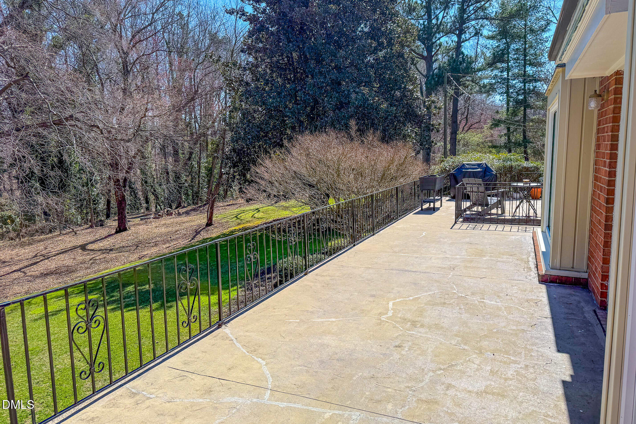 382 Wimbledon Drive Roxboro, NC 27573 - Photo 50 of 66 a view of two chairs and table in the balcony