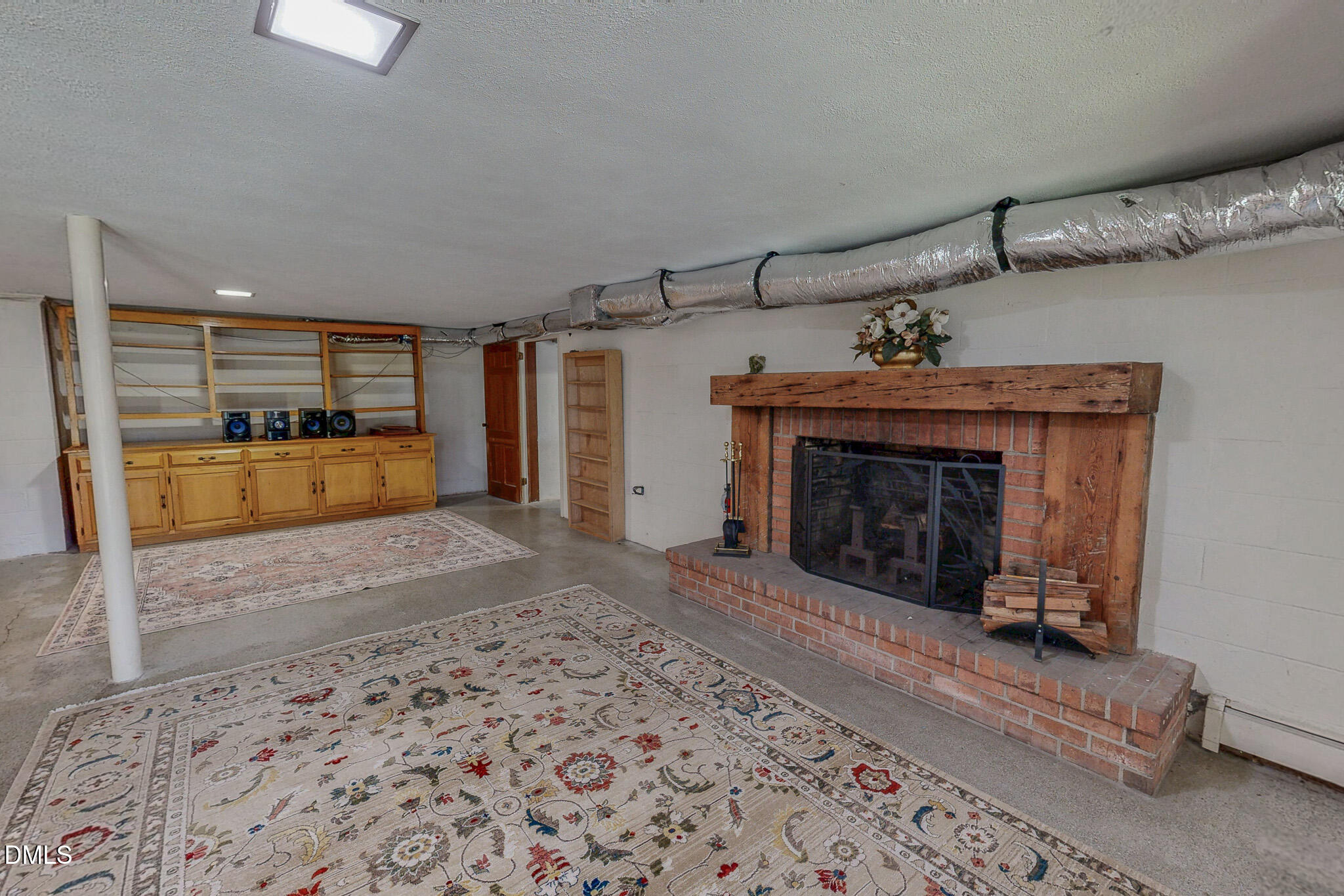 382 Wimbledon Drive Roxboro, NC 27573 - Photo 56 of 66 a view of a livingroom with a fireplace