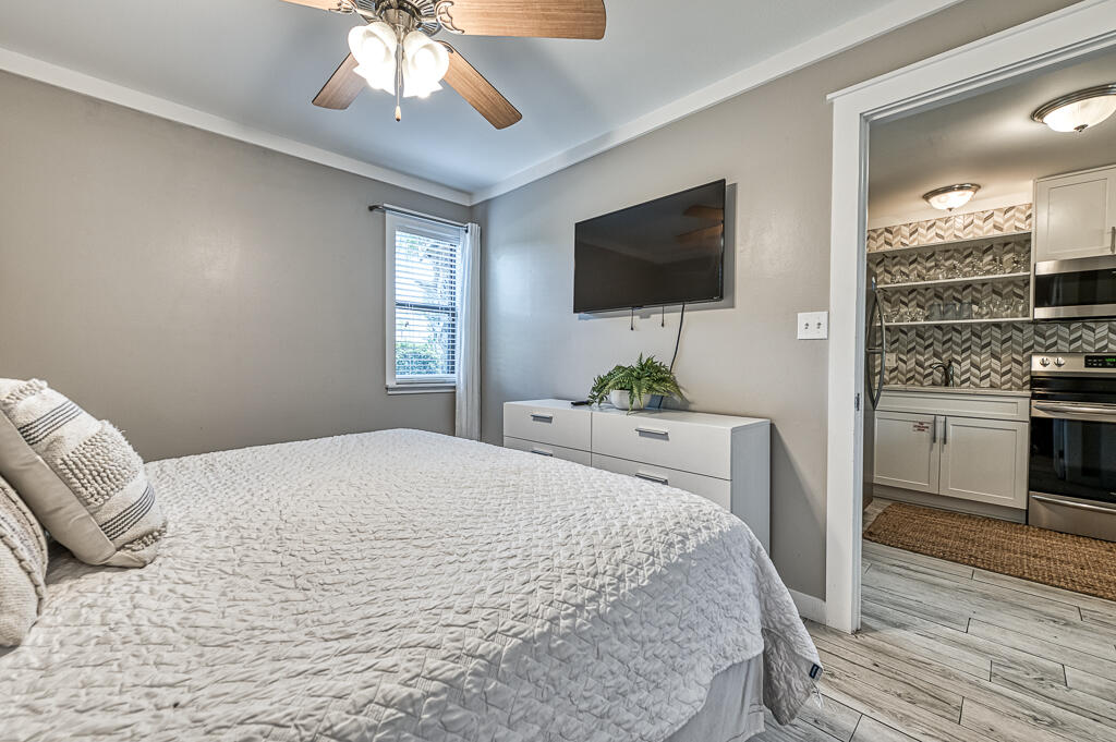 3799 East County Highway 30A, Unit C3 Santa Rosa Beach, FL 32459 - Photo 27 of 43 a bedroom with a bed and a flat screen tv