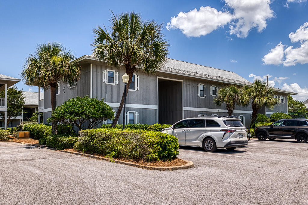 3799 East County Highway 30A, Unit C3 Santa Rosa Beach, FL 32459 - Photo 31 of 43 a view of a car parked in front of a house