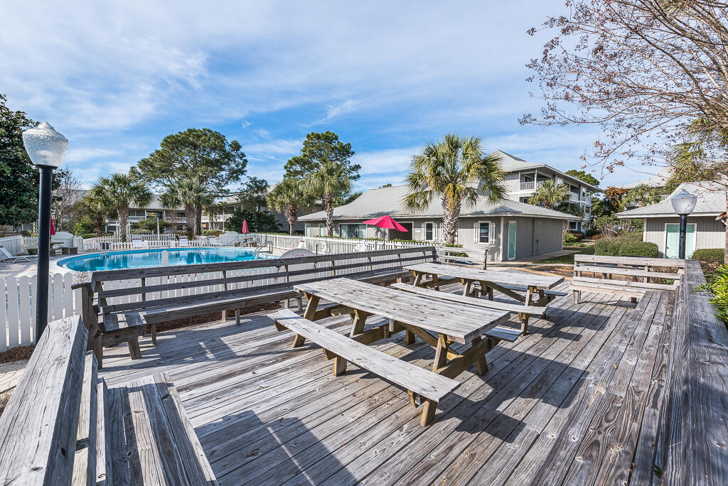 3799 East County Highway 30A, Unit C3 Santa Rosa Beach, FL 32459 - Photo 33 of 43 a view of a balcony with wooden floor and city view