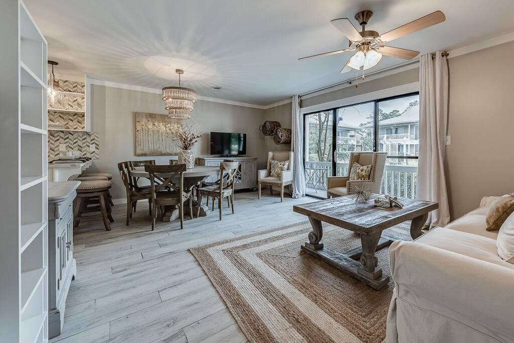 3799 East County Highway 30A, Unit C3 Santa Rosa Beach, FL 32459 - Photo 7 of 43 a view of a livingroom with furniture window and wooden floor
