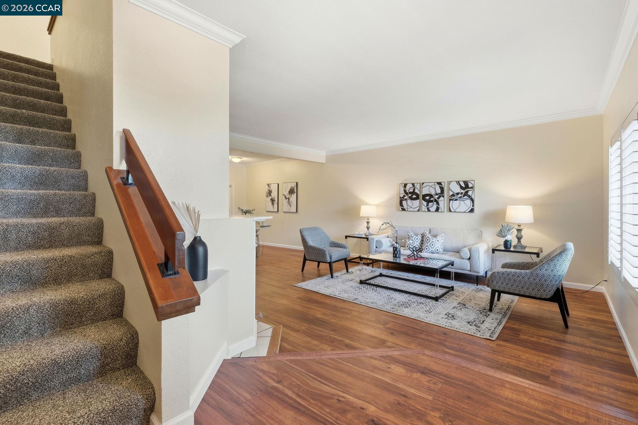 1707 Geary Road Walnut Creek, CA 94597 - Photo 5 of 43 a living room with furniture and a wooden floor