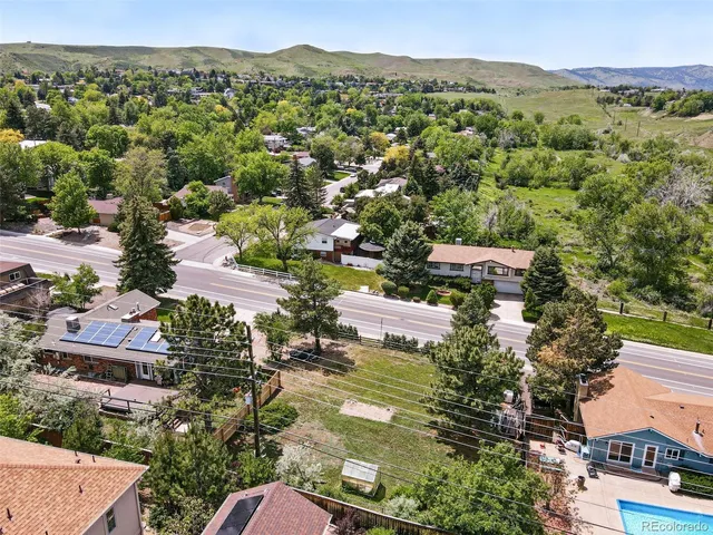 an aerial view of residential house with outdoor space