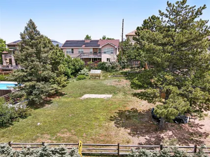 a view of a city with a lake