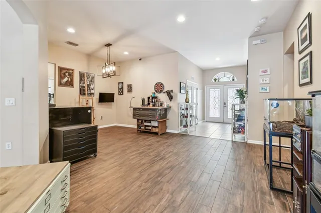 a view of a livingroom with furniture and wooden floor