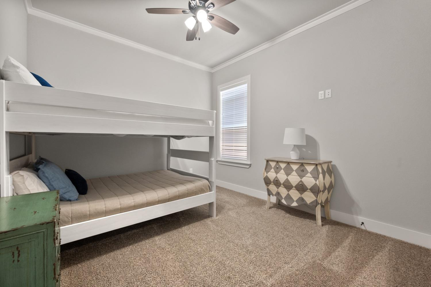 7805 52nd Street Lubbock, TX 79407 - Photo 24 of 32 a bedroom with bed and window