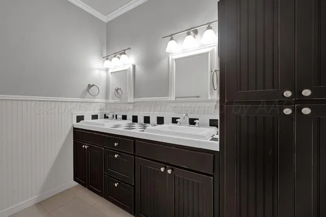 a bathroom with a toilet a sink and bathtub
