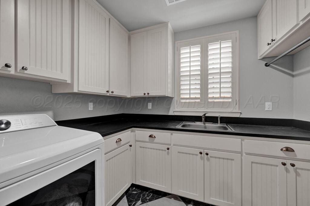 6007 Riley Elizabeth Place Amarillo, TX 79119 - Photo 26 of 33 laundry room