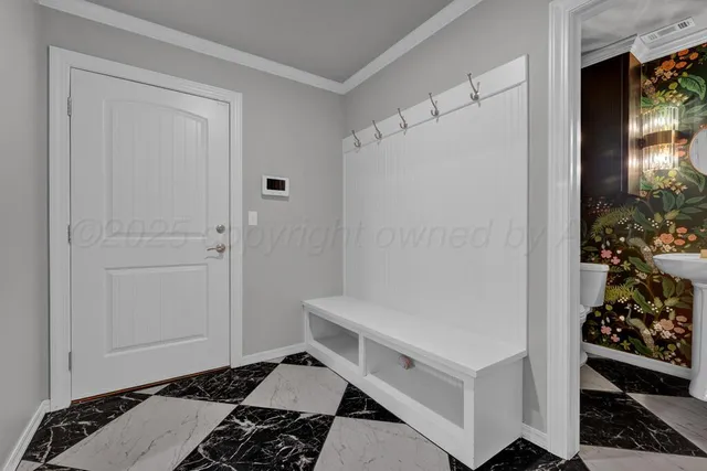 a bathroom with a granite countertop sink a toilet a mirror and shower