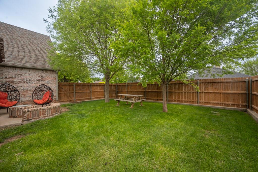 6007 Riley Elizabeth Place Amarillo, TX 79119 - Photo 31 of 33 backyard 6