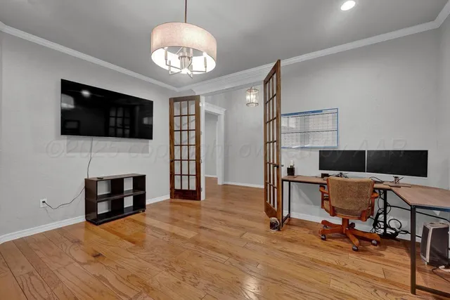 a kitchen with kitchen island a sink stove and refrigerator