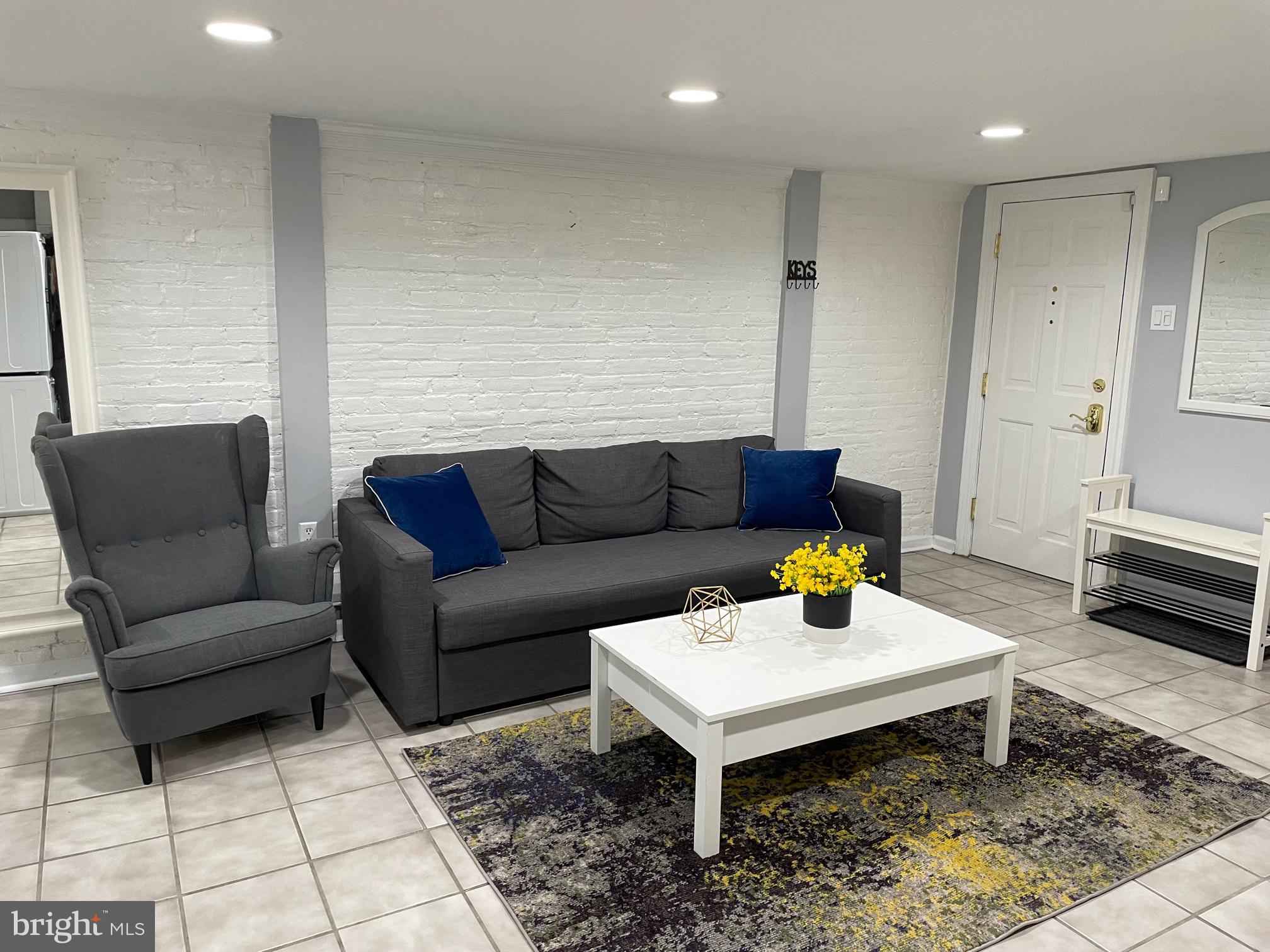 549 4th Street Southeast Washington, DC 20003 - Photo 26 of 33 Lower Level Living Room w/ Separate Entrance