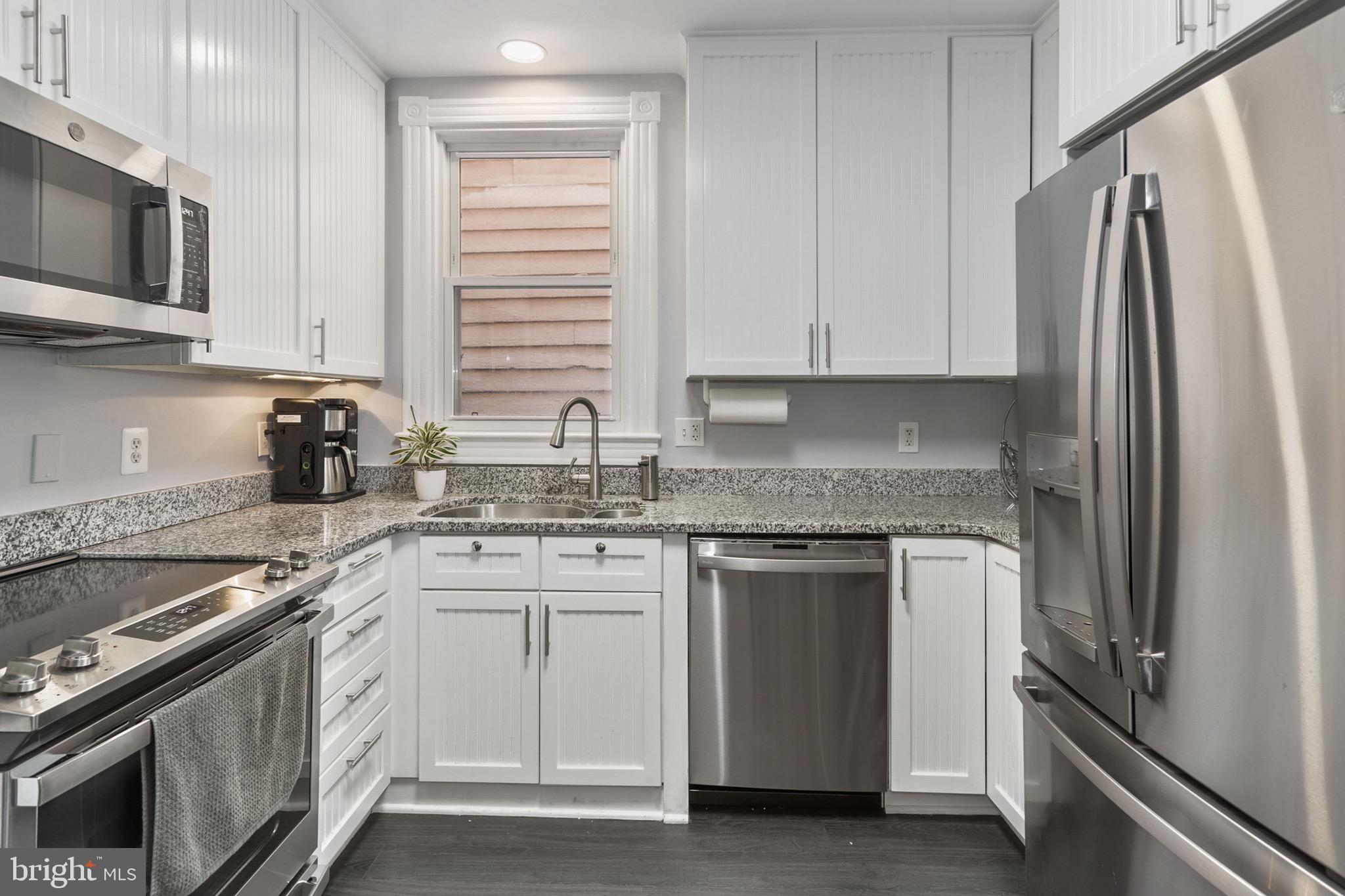 549 4th Street Southeast Washington, DC 20003 - Photo 9 of 33 Renovated Kitchen w/ New Stainless Steel Appliance