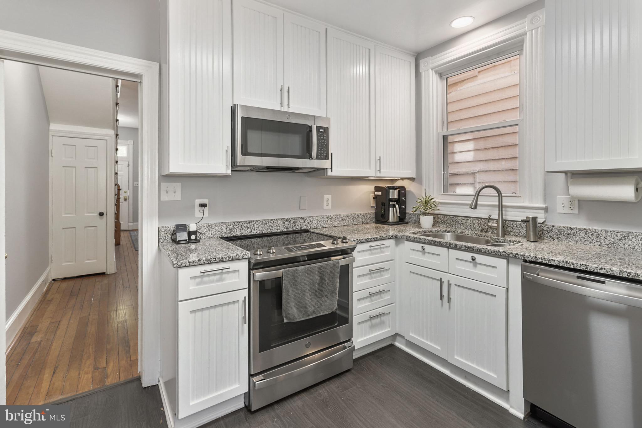549 4th Street Southeast Washington, DC 20003 - Photo 10 of 33 Renovated Kitchen w/ New Wood Tile