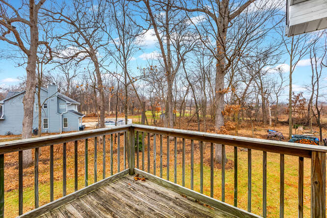 2658 East 1559th Road Ottawa, IL 61350 - Photo 11 of 53 a view of a wooden street from a balcony
