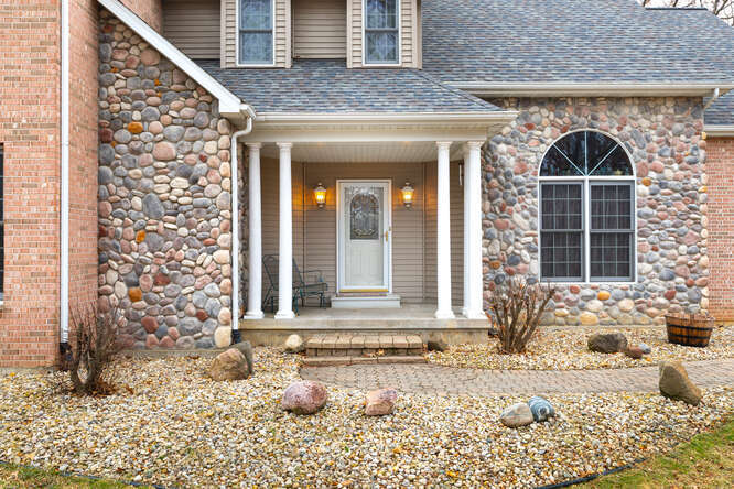 2658 East 1559th Road Ottawa, IL 61350 - Photo 14 of 53 a front view of a house with a yard