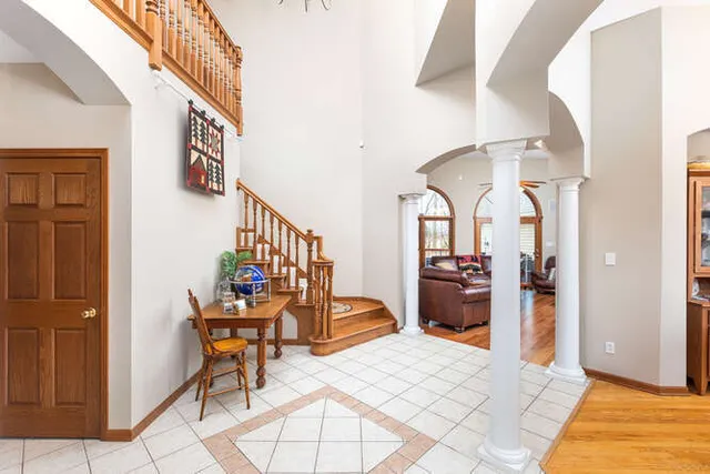 a view of living room with furniture and fireplace