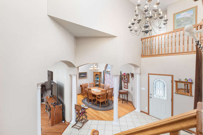 2658 East 1559th Road Ottawa, IL 61350 - Photo 18 of 53 a living room with furniture a rug and a window