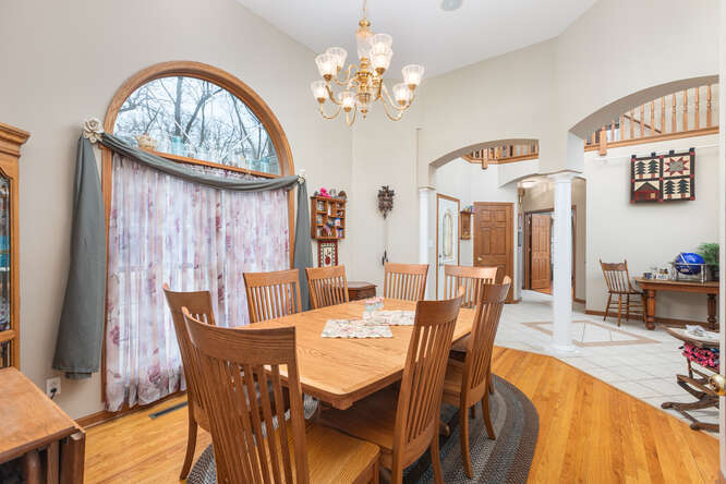 2658 East 1559th Road Ottawa, IL 61350 - Photo 19 of 53 a view of a dining room with furniture and a chandelier