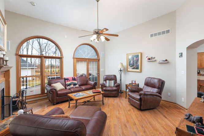2658 East 1559th Road Ottawa, IL 61350 - Photo 21 of 53 a living room with furniture two window and wooden floor